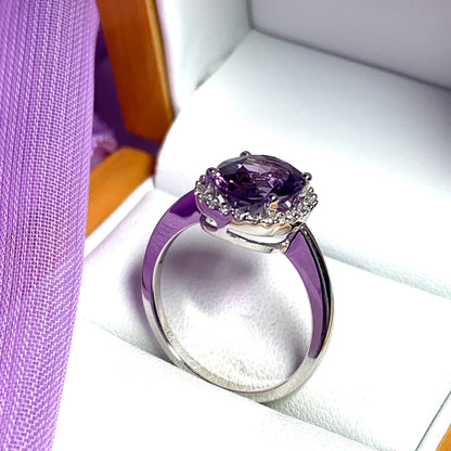 Purple oval amethyst and diamond white gold cluster ring