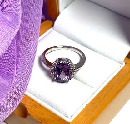 Purple oval amethyst and diamond white gold cluster ring