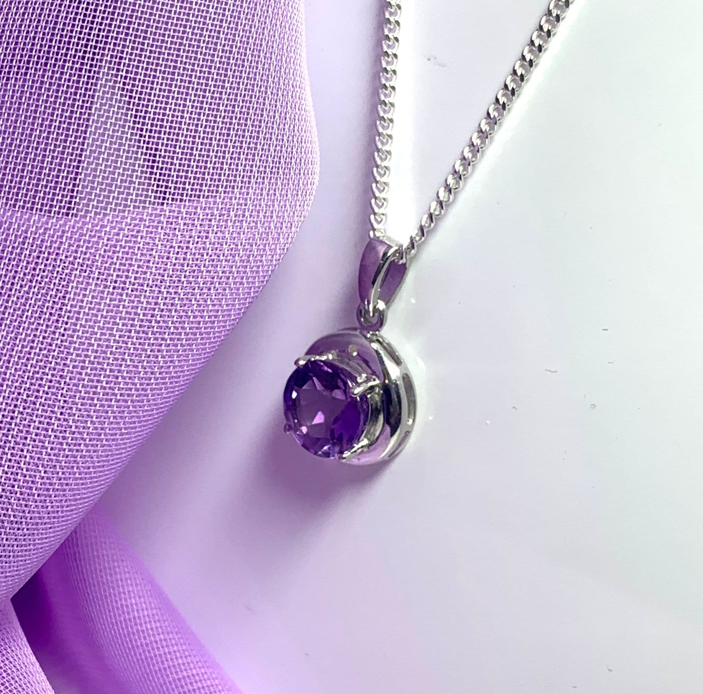 Round purple amethyst and diamond sterling silver necklace