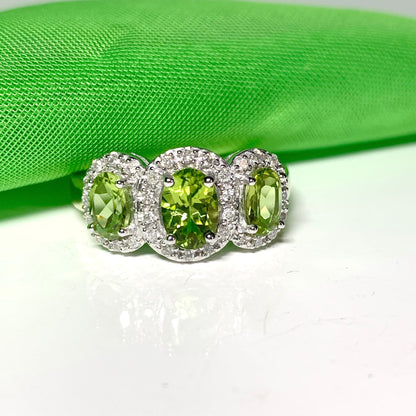 Trilogy Triple Oval Peridot and Diamond Yellow Gold Cluster Ring