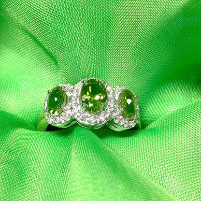 Trilogy Triple Oval Peridot and Diamond Yellow Gold Cluster Ring